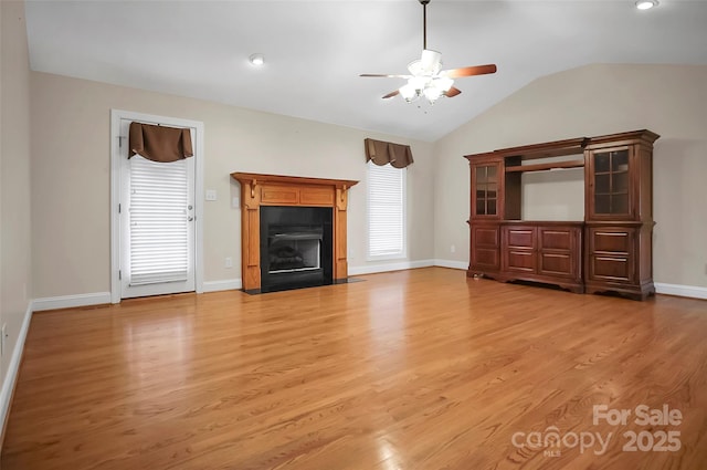 814 Settlers Dr, Cherryville, NC 28021 - unfurnished living room featuring a ceiling fan, lofted ceiling, light wood finished floors, a fireplace with flush hearth, and recessed lighting
