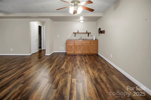 814 Settlers Dr, Cherryville, NC 28021 - indoor wet bar with dark wood-style floors, ceiling fan, and baseboards