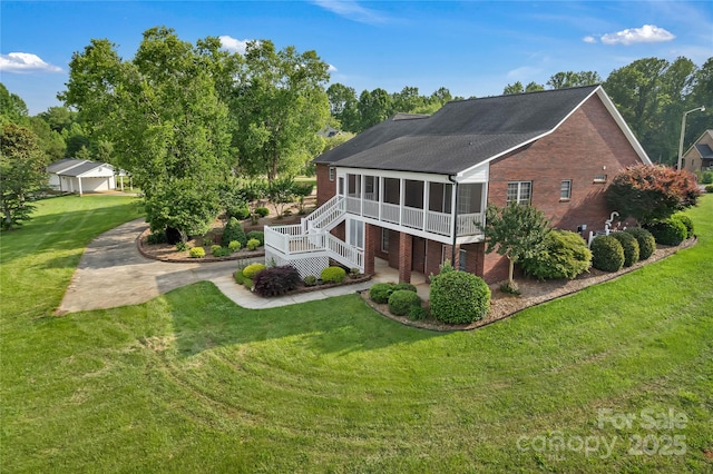 814 Settlers Dr, Cherryville, NC 28021 - rear view of property with a sunroom, brick siding, stairs, and a lawn