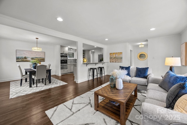 917 Dent Ct, Charlotte, NC 28210 - living area with dark wood-style flooring, recessed lighting, and crown molding