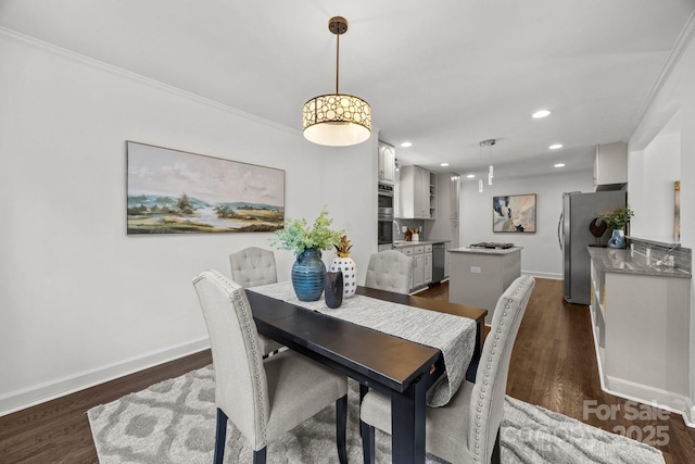 917 Dent Ct, Charlotte, NC 28210 - dining room featuring dark wood-type flooring, recessed lighting, and crown molding
