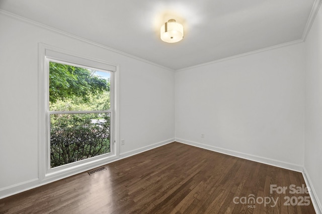917 Dent Ct, Charlotte, NC 28210 - empty room with dark wood finished floors and crown molding