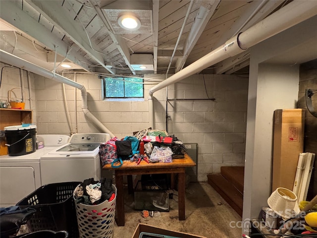 laundry area with washing machine and dryer