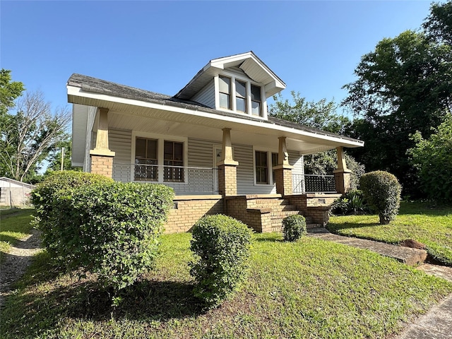 462 Dave Lyle Blvd, Rock Hill, SC 29730 - view of front of home featuring covered porch, brick siding, and a front lawn