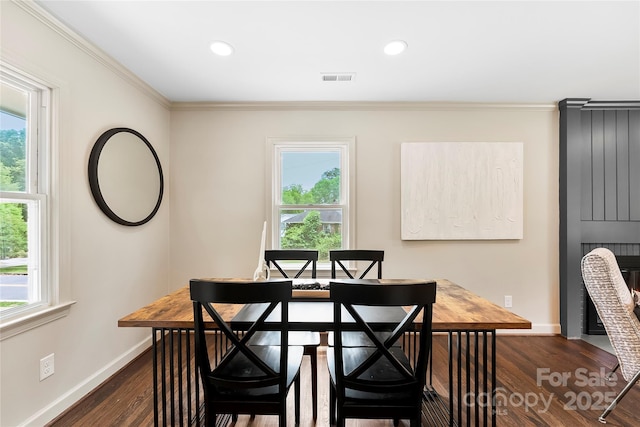 3661 Annlin Ave, Charlotte, NC 28209 - dining area featuring crown molding, baseboards, dark wood-style flooring, and recessed lighting
