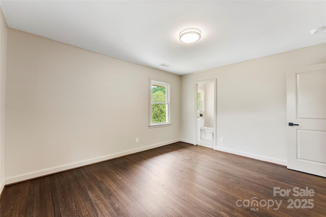 3661 Annlin Ave, Charlotte, NC 28209 - unfurnished room with dark wood-style flooring, baseboards, and a smoke detector