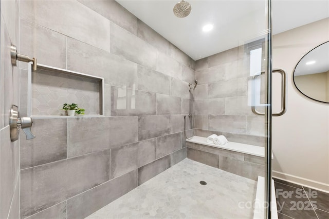 3661 Annlin Ave, Charlotte, NC 28209 - bathroom with a tile shower and recessed lighting