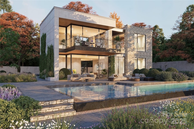 back of house featuring a balcony, an outdoor living space, an infinity pool, a patio area, and stone siding