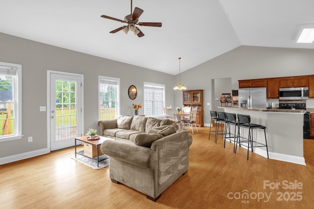 170 Wagon Wheel Way Unit 4, Salisbury, NC 28147 - living area featuring light wood-style floors, healthy amount of natural light, ceiling fan, and high vaulted ceiling