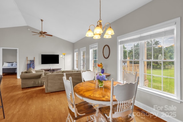 170 Wagon Wheel Way Unit 4, Salisbury, NC 28147 - dining area featuring vaulted ceiling, healthy amount of natural light, light wood finished floors, a chandelier, and a ceiling fan