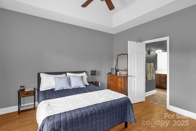 170 Wagon Wheel Way Unit 4, Salisbury, NC 28147 - bedroom with wood finished floors, baseboards, a ceiling fan, and a raised ceiling