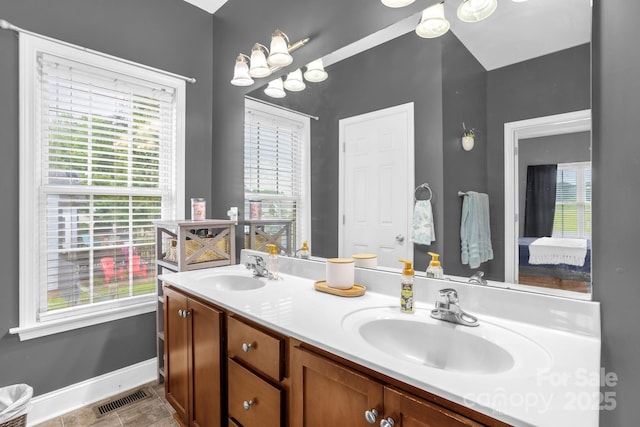 170 Wagon Wheel Way Unit 4, Salisbury, NC 28147 - bathroom with double vanity, baseboards, and tile patterned flooring
