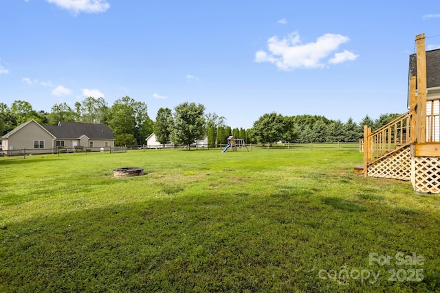 170 Wagon Wheel Way Unit 4, Salisbury, NC 28147 - view of yard with a playground and a fire pit