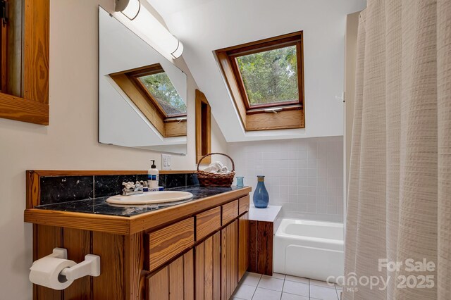 214 Laurel Mountain Trl, Saluda, NC 28773 - bathroom with a skylight, a tub to relax in, tile patterned flooring, vanity, and a shower with curtain