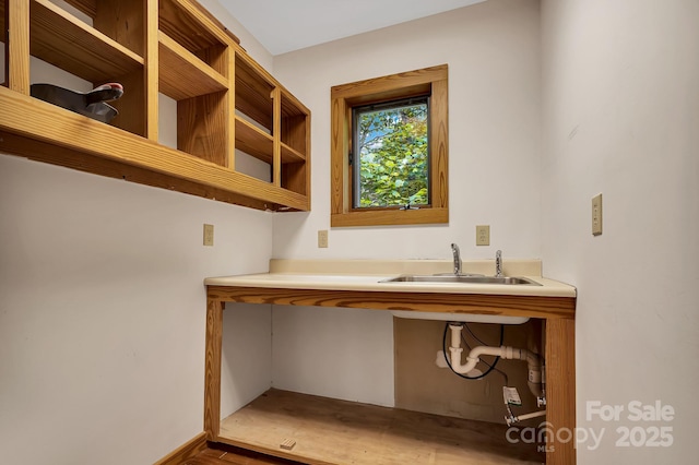214 Laurel Mountain Trl, Saluda, NC 28773 - office area with a sink and wood finished floors