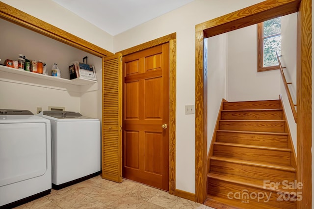 214 Laurel Mountain Trl, Saluda, NC 28773 - laundry area with washing machine and clothes dryer and baseboards