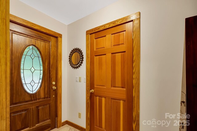 214 Laurel Mountain Trl, Saluda, NC 28773 - foyer entrance featuring baseboards