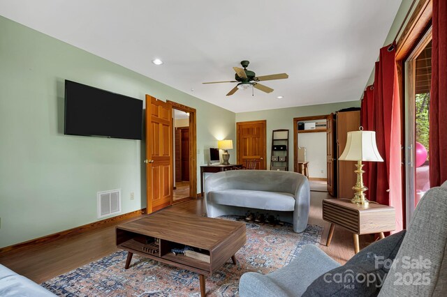 214 Laurel Mountain Trl, Saluda, NC 28773 - living area with a ceiling fan, wood finished floors, baseboards, and recessed lighting