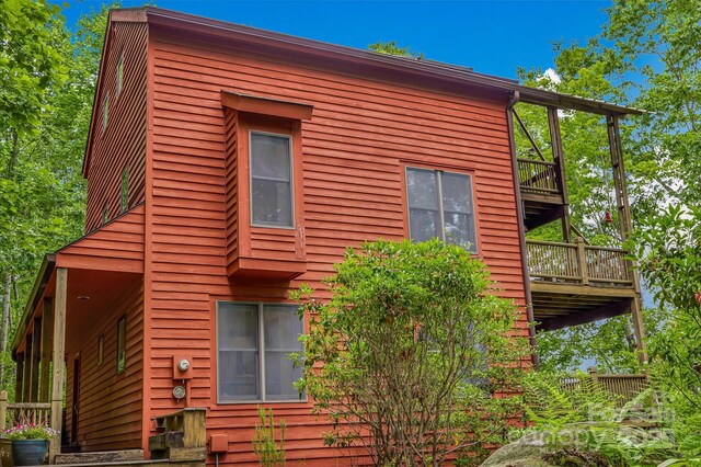 214 Laurel Mountain Trl, Saluda, NC 28773 - view of side of property featuring a deck