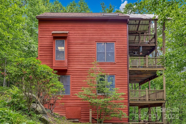 214 Laurel Mountain Trl, Saluda, NC 28773 - view of property exterior with a deck