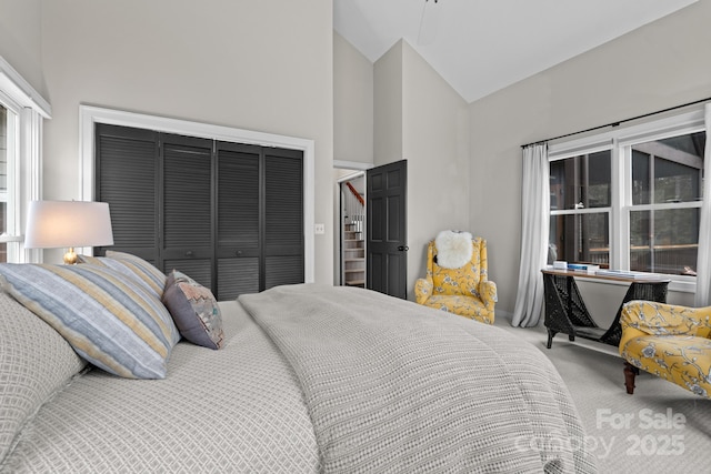 140 Lost Trl Unit 145, Highlands, NC 28741 - carpeted bedroom featuring high vaulted ceiling and a closet