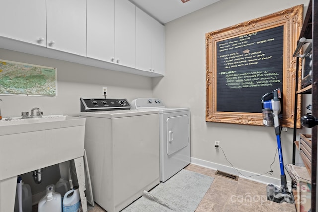 140 Lost Trl Unit 145, Highlands, NC 28741 - laundry room with cabinet space, independent washer and dryer, and baseboards