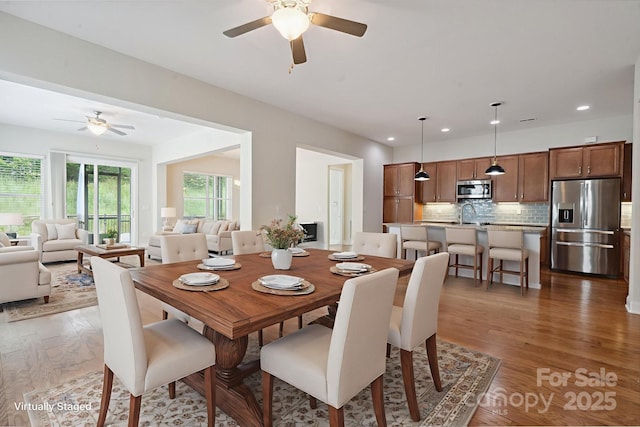 467 Granite Lake Ct, Denver, NC 28037 - dining room with a ceiling fan, wood finished floors, and recessed lighting