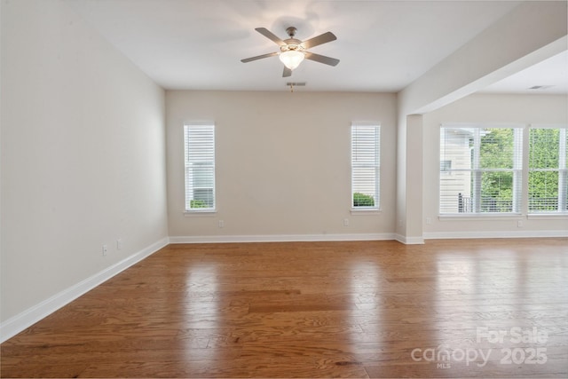 467 Granite Lake Ct, Denver, NC 28037 - empty room featuring ceiling fan, wood finished floors, and baseboards
