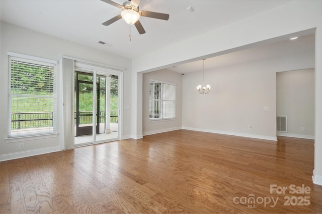 467 Granite Lake Ct, Denver, NC 28037 - unfurnished room featuring a chandelier, wood finished floors, and plenty of natural light