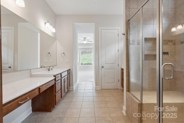 467 Granite Lake Ct, Denver, NC 28037 - bathroom featuring ceiling fan, tile patterned flooring, vanity, a shower stall, and baseboards