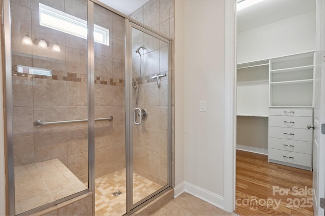 467 Granite Lake Ct, Denver, NC 28037 - full bathroom featuring a shower stall, baseboards, and a spacious closet