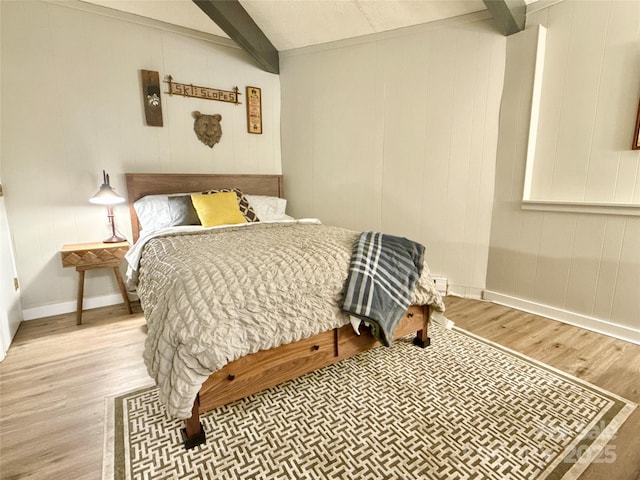 109 Beechwood Ln, Beech Mountain, NC 28604 - bedroom featuring beam ceiling, wood finished floors, and baseboards