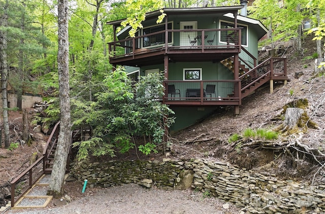 109 Beechwood Ln, Beech Mountain, NC 28604 - rear view of property with stairway and a wooden deck