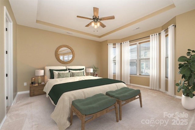 3105 Bonterra Blvd, Indian Trail, NC 28079 - bedroom with a raised ceiling, light carpet, baseboards, and a ceiling fan