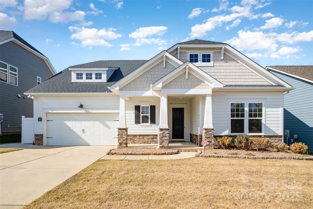 3105 Bonterra Blvd, Indian Trail, NC 28079 - craftsman inspired home with stone siding, a garage, covered porch, and concrete driveway