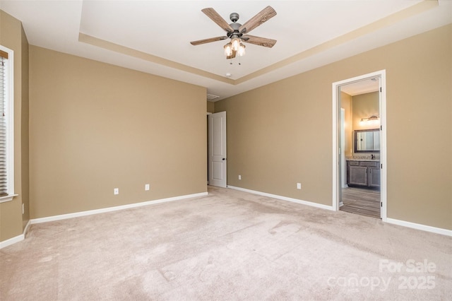 3105 Bonterra Blvd, Indian Trail, NC 28079 - unfurnished bedroom with light colored carpet and a tray ceiling