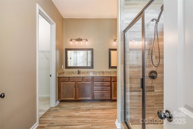 3105 Bonterra Blvd, Indian Trail, NC 28079 - full bathroom with a shower stall, vanity, a spacious closet, and wood finished floors