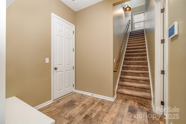 3105 Bonterra Blvd, Indian Trail, NC 28079 - staircase featuring wood finished floors and baseboards