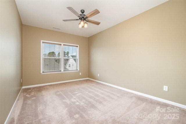 3105 Bonterra Blvd, Indian Trail, NC 28079 - spare room with light carpet, baseboards, and ceiling fan