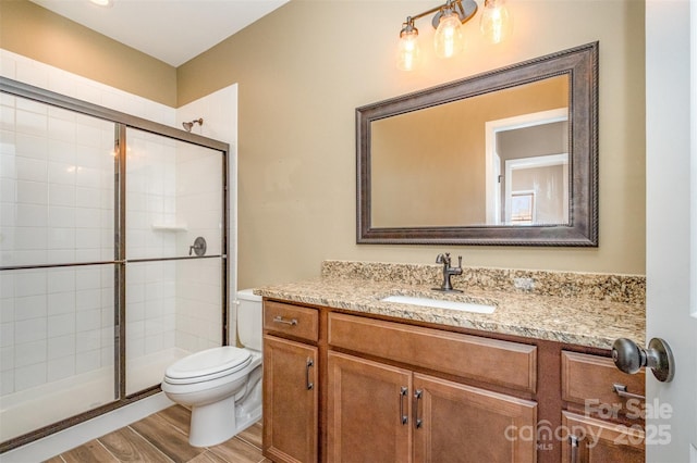 3105 Bonterra Blvd, Indian Trail, NC 28079 - bathroom with toilet, wood finished floors, vanity, and a stall shower