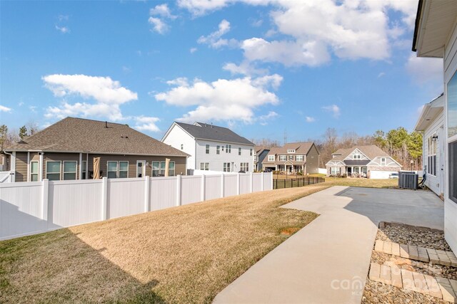 3105 Bonterra Blvd, Indian Trail, NC 28079 - view of yard featuring a residential view, central air condition unit, and a patio