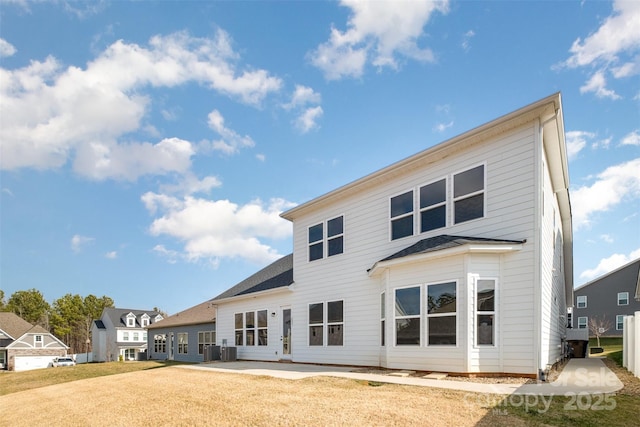 3105 Bonterra Blvd, Indian Trail, NC 28079 - rear view of property featuring a lawn and a patio