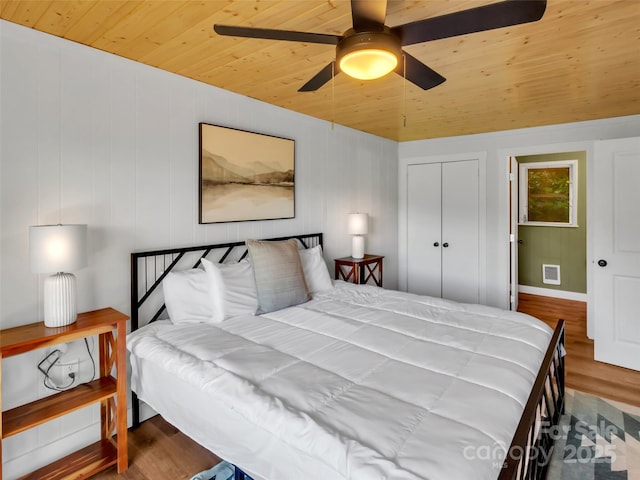 80 Hidden Falls Rd, Maggie Valley, NC 28751 - bedroom featuring wood finished floors, wood ceiling, a closet, a ceiling fan, and lofted ceiling