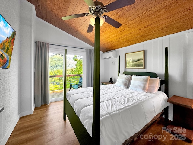 80 Hidden Falls Rd, Maggie Valley, NC 28751 - bedroom featuring wood ceiling, a wall mounted AC, lofted ceiling, access to exterior, and wood finished floors