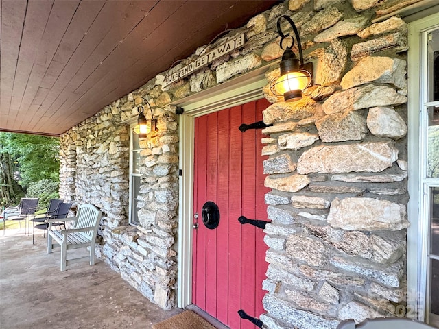 80 Hidden Falls Rd, Maggie Valley, NC 28751 - doorway to property with stone siding