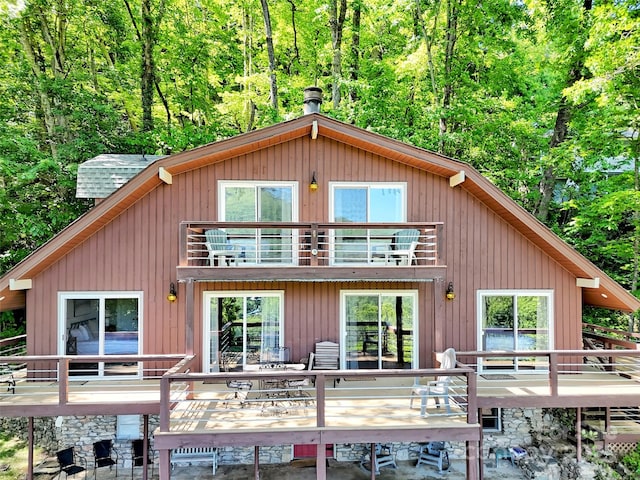80 Hidden Falls Rd, Maggie Valley, NC 28751 - back of house featuring a balcony, a forest view, and a wooden deck