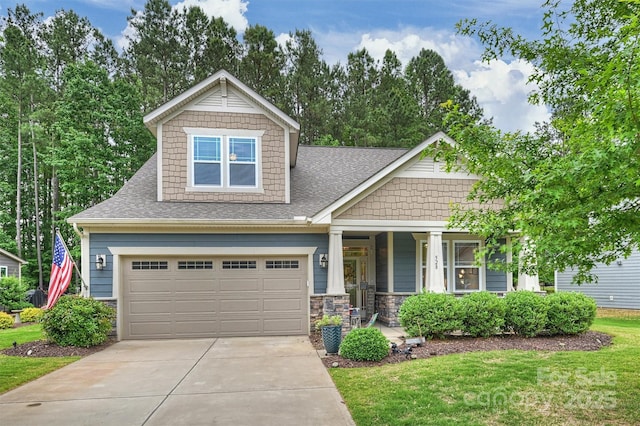 528 Sandbar Pt, Clover, SC 29710 - craftsman inspired home featuring a porch, roof with shingles, driveway, and a front yard
