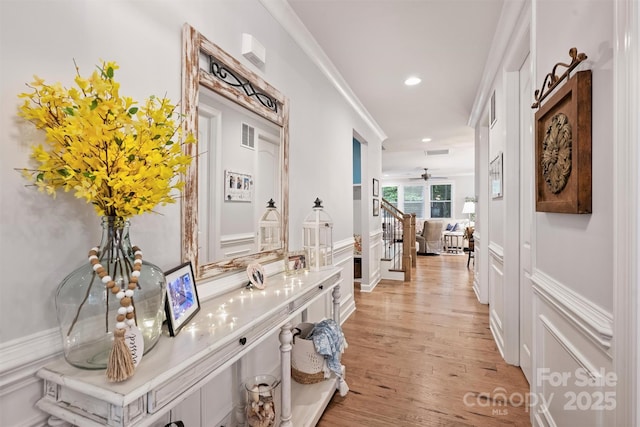 528 Sandbar Pt, Clover, SC 29710 - hall featuring stairs, light wood-style flooring, a decorative wall, recessed lighting, and a wainscoted wall