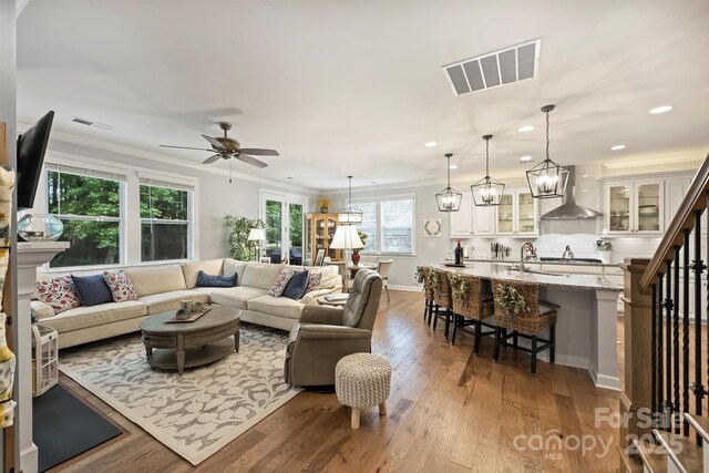 528 Sandbar Pt, Clover, SC 29710 - living room with hardwood / wood-style floors, ornamental molding, recessed lighting, ceiling fan, and baseboards