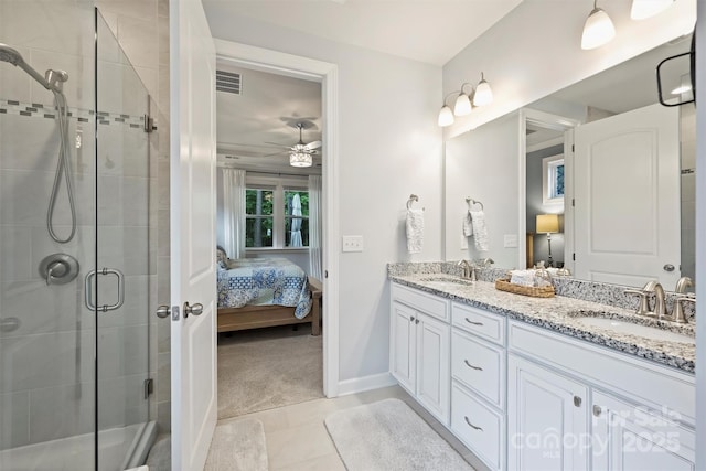 528 Sandbar Pt, Clover, SC 29710 - ensuite bathroom with a shower stall, a ceiling fan, double vanity, baseboards, and tile patterned floors